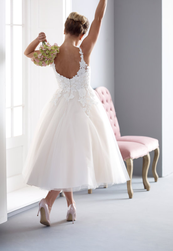 Classic tulle and lace wedding dress tea length.